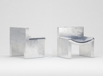 Armchair in cast aluminium